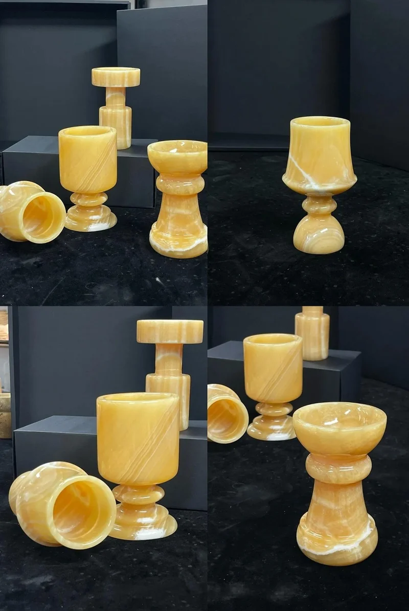Golden-toned stone holders with different heights and bowl profiles
