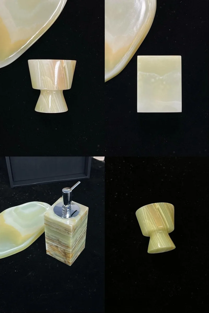 Four views of pale green stone accessories, including a tray, holder and pump dispenser