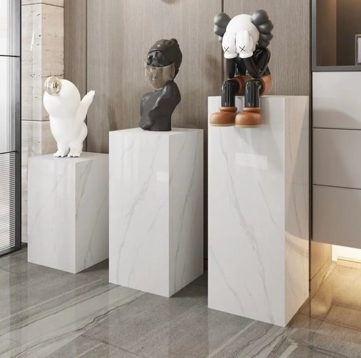 Gallery display using stone pedestals