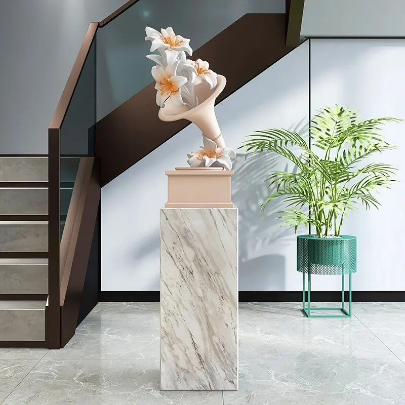Stone pedestal in a modern interior