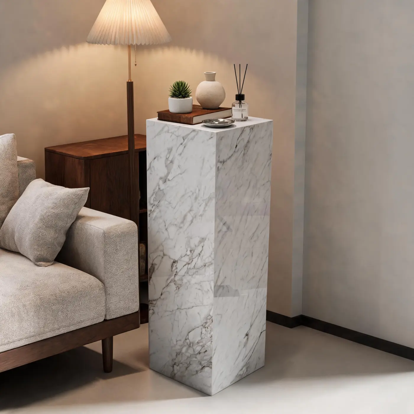 Snow White pedestal beside soft lounge furniture