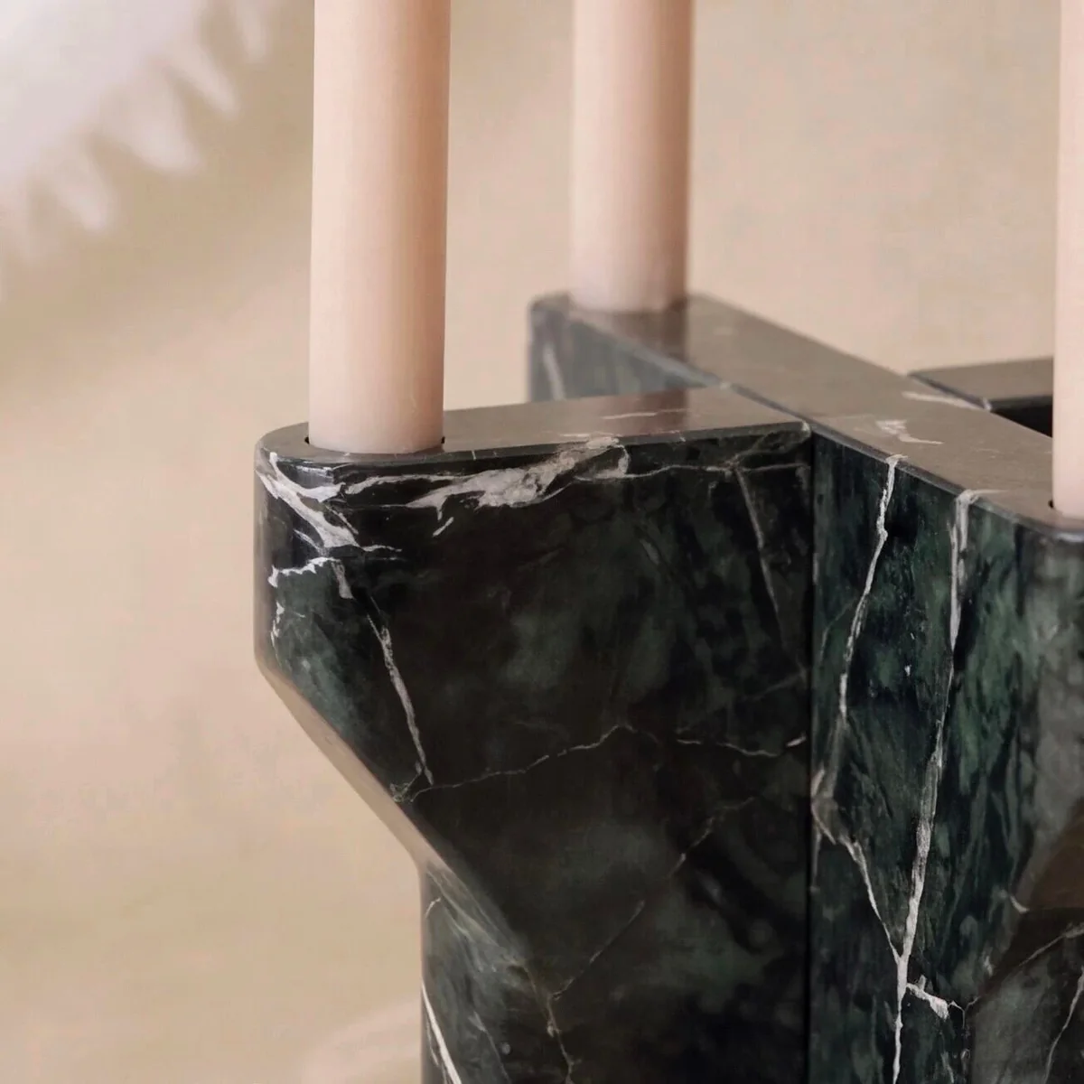 Dark green veined stone candleholder top detail