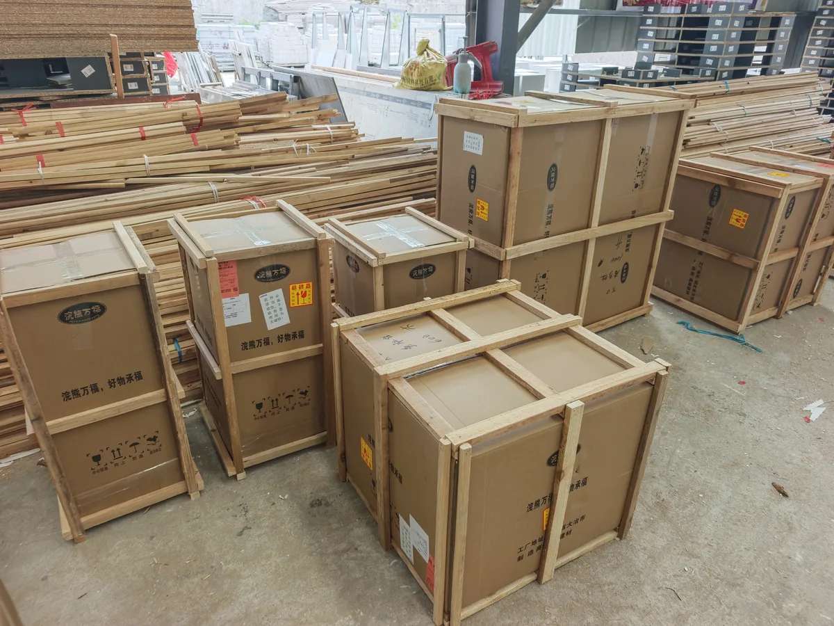 A cardboard package reinforced with a wooden frame